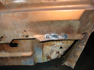 RR REAR WELDS BEFORE REPAIR RH.jpg